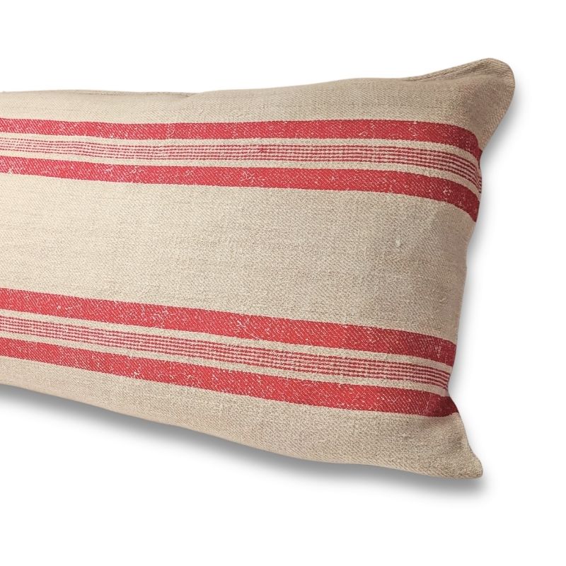 Lumbar cushion, Szekely Collection, oatmeal antique handspun hemp, 4-shaft twill weave, coral red stripe group — one wide flanked by two narrow lines, Transylvania
